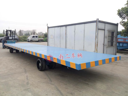 1676511937141453.jpg 30噸10米重型平板拖車3I.jpg