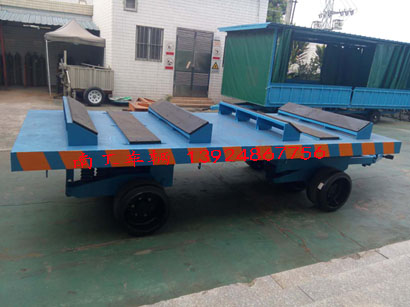 1676945603615331.jpg 30噸重型鐵皮卷圓桶專(zhuān)用平板車(chē)3I.jpg