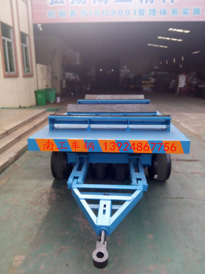 1676945644369315.jpg 30噸重型鐵皮卷圓桶專(zhuān)用平板車(chē)1I.jpg